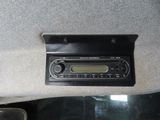a radio in the back of a car with a remote control