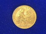 l'image d'une pièce d'or sur un fond bleu