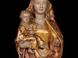 an image of a statue of a woman holding a child