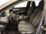 the interior of a car with the door open and the driver ' s seat down