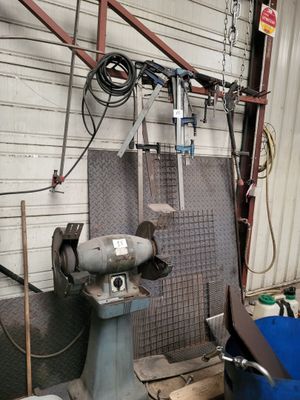 a machine that is sitting inside of a garage