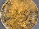 une image représentant une médaille d'or sur laquelle figurent un homme et une femme