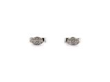 a pair of diamond stud earrings on a white background