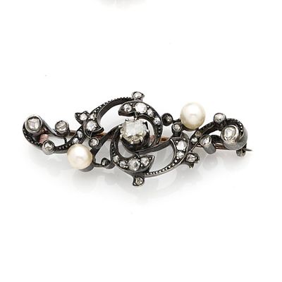 Petite broche en argent noirci (800e) et or 18k (750e), styl…