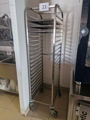an image of a commercial kitchen with stainless steel racks
