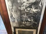 an old picture frame with a picture of a man and a woman on it