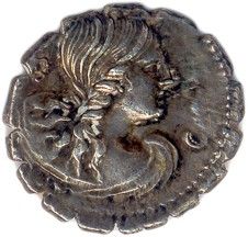une pièce de monnaie en argent portant un visage de femme