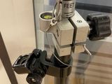 an image of a close up of a camera on a tripod