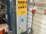 a machine that is sitting inside of a garage
