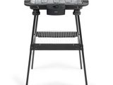 a close up of a grill on a white background with a white background