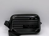 a close up of a black bag on a white background