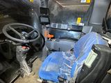 a car with a steering wheel and a seat in it