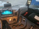 a picture of a car dashboard with a monitor on it