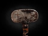 a hammer that has two crosses on it