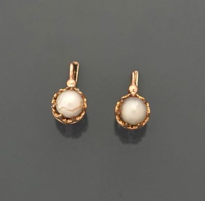 Paire de dormeuses en or rose 18K 750 millièmes chacune cent…