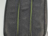 a black case with a green stripe on it