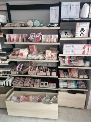 a lot of items on the shelves in the store