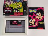 two nintendo games sitting on a table next to each other