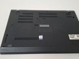 the bottom of a laptop with the bottom panel removed