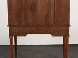 an old wooden desk with a drawer on top of it