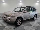 a picture of a silver suv parked in a room