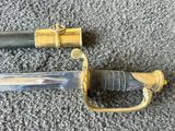 two swords that are laying side by side on the floor