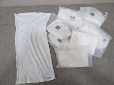 a lot of items that are sitting on a bed