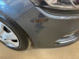 a close up of a car ' s bumper with a sticker on it