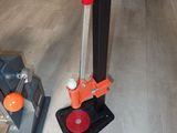 a picture of a red and black floor polisher and a black and red floor polisher