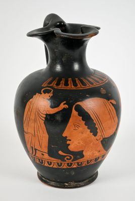 a vase that has a picture of a man and a woman on it