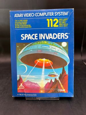 a box with a picture of a space invader on it