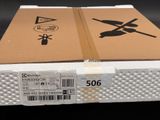 a box with a sticker on it sitting on a table