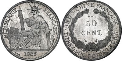 a close up of a coin with a statue on it