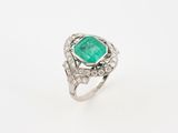 an emerald and diamond ring