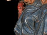 an image of a statue of a man sitting on a chair