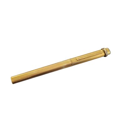 a close up of a brass screw on a white background