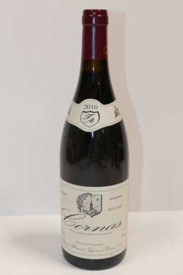 a bottle of wine that is sitting on a table