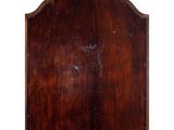 an old wooden plaque with a carved edge on a white background