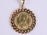 l'image d'une pièce d'or surmontée d'une couronne