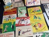 many different types of advertising cards on a table