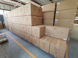 many boxes stacked on top of each other in a warehouse