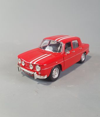 a red toy car with a white stripe on it
