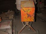 a yellow box sitting on top of a table in the middle of a room