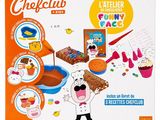 une boîte contenant un kit de pâtisserie « Craft Club » avec un chef et des cupcakes