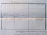 an old document with writing on it sitting on a table