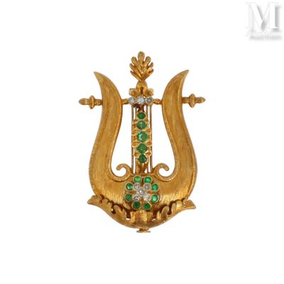 Broche lyre Broche en or jaune 18K (750°/°°) stylisant une l…