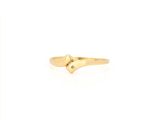 an image of a gold ring with a heart on it