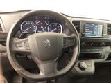 dashboard view of a car with a steering wheel and dashboard lights