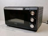 an image of a toaster oven on a table