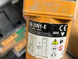 a close up of a yellow fire hydrant with a sticker on it